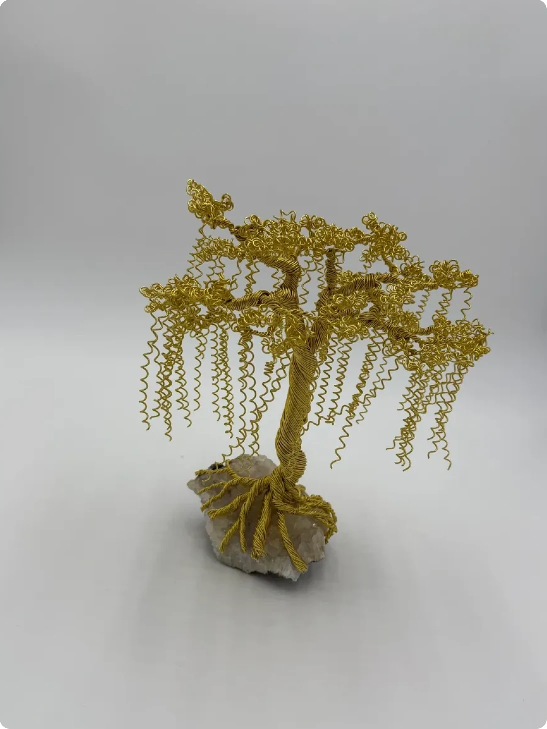 Artistic gold wire tree artwork